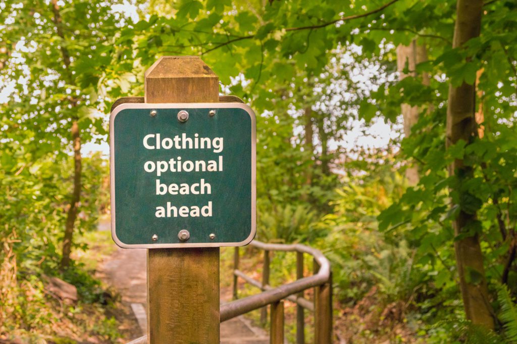 Clothing Optional signage